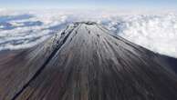 Mount Fuji finally has snow at its peak following record-breaking absence