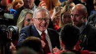 Australia's re-elected prime minister says voters chose unity over division