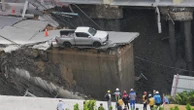 Bangkok road collapse creates a sinkhole disrupting traffic and prompting evacuations