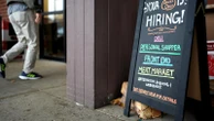 US filings for jobless aid, a proxy for layoffs, inch down modestly last week