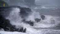 Typhoon lashes Japan with torrential rain and strong winds on a slow crawl north