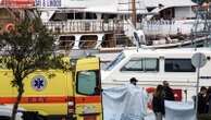 Greek authorities say boat capsizing victims and survivors were from Afghanistan. 2 Turks arrested