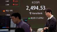 Stock market today: Asian shares rise after tech stocks pull Wall Street to another record