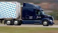 Autonomous truck company Aurora delays hauling freight without human drivers until April