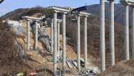 An elevated part of a highway being built in South Korea collapses, killing 3 workers