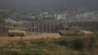 Israeli strikes across Gaza kill more than 30 as the sides weigh the latest cease-fire proposal