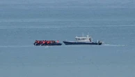 1 person dies when a boat overloaded with migrants sinks in the English Channel