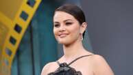 Selena Gomez visits high school volleyball team