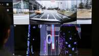 Japan's Nissan tests driverless vehicles in city streets filled with cars and people