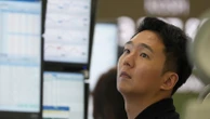 Asian shares are mixed after stocks add a bit to their records on Wall Street