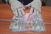 Rabu Pagi, Rupiah Dibuka Melemah ke Level Rp14.262 per Dolar AS