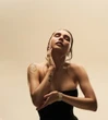 Українська гімнастка-ювілярка похизувалася стрункою фігурою та пишним бюстом перед камерою