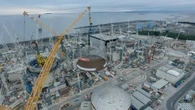 La forza di “Big Carl”: la gru più grande del mondo solleva la cupola della centrale nucleare