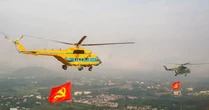 10 trực thăng thao luyện kéo cờ Đảng, cờ Tổ quốc trên bầu trời Hà Nội