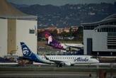 Alaska Airlines Atmos Rewards program: How to earn and redeem points, elite status and more