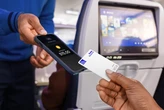 United launches mileage-earning debit card with unique savings tie-in