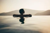 Business travel comes with perks. Here's how to share them