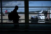 Flight delays 'mounting' as shutdown, weather strain control towers, TSA checkpoints