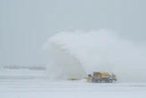 Mass Saturday flight cancellations begin as another winter storm takes aim at East Coast