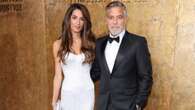 Geoerge e Amal Clooney per il red carpet di coppia: lei sembra una sposa con l’abito bianco