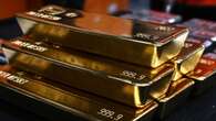 Aussie shares flirt with all-time high as gold sets one