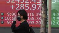 Asian stocks shaky, oil at three-year lows