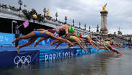 liveFollow live: Athletes brave Seine as triathlons kick off