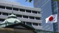 BOJ raises interest rates, lays out bond taper plan