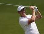 McIlroy unimpressed by his new golf swing in Abu Dhabi