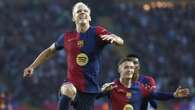 Olmo double leads Barcelona to city derby win