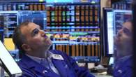 Wall St muted amid focus on US data, Fed commentary