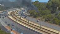 breakingTraffic chaos on busy Perth freeway after van catches fire