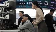 Shares slip in Asia, dollar firm as US data looms