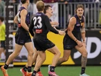 Freo survive major scare as Roos comeback falls short
