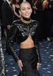 Miley Cyrus only wears 'very modest bathing suits'