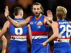 Bont BOG as Treloar hurt again, Dogs devour Tigers