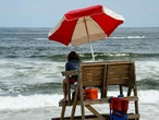 ‘Protruding by a foot’: Lifeguard impaled by beach umbrella