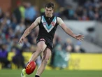 Port ace to put footy over family in long-term decision