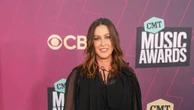 Alanis Morissette feels 'protected' by her long hair