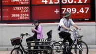 Asian shares rally while US dollar weakens