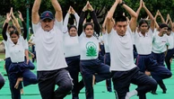 Home stretch: Indians strike a pose for world yoga day