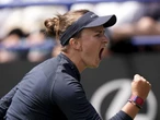 Wimbledon champ in survival mode again at Eastbourne