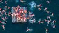 Nude swimmers brave chilly waters for solstice swim