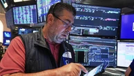 Wall Street hits new peaks on trade, rate cut hopes