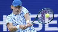 De Minaur wins all-Aussie affair to reach Open quarters