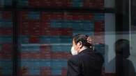 Asian stocks slide, yen wobbles ahead of BOJ verdict