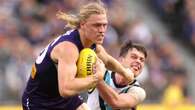 Dockers star Young tried to play on with a broken leg