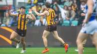 Hawthorn thrash Kangaroos, clinch AFL top eight spot