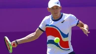 De Minaur battles into Queen's semis
