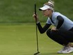 Korda shoots 66 to keep bid for golfing history alive